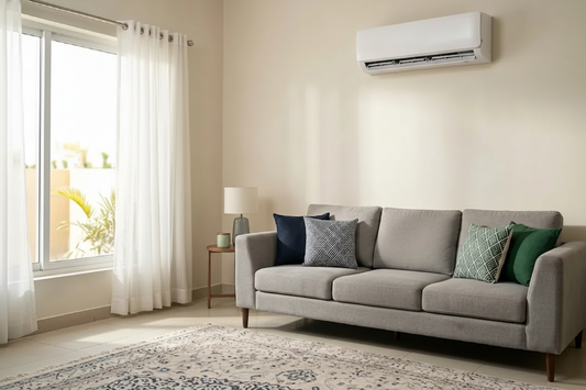 Living room with wall-mounted split AC unit - no people
